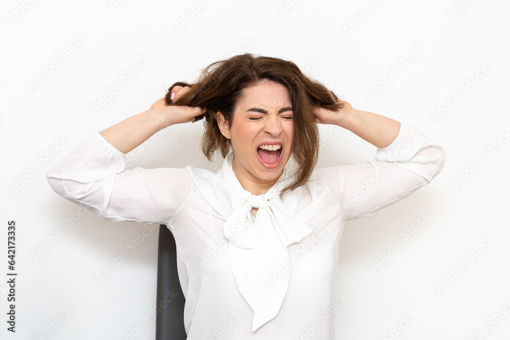 Scene of anger and hysterism of an employee who has a nervous crisis Scene of anger and hysterism of an employee who has a nervous crisis