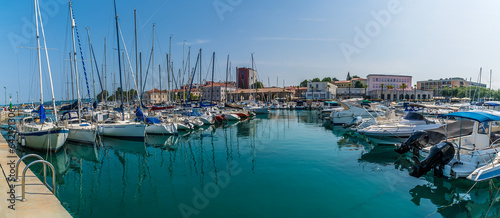 A view across the harbour and moored boats in Koper, Slovenia in summertime