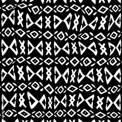 White background with black pattern.Repeat Pattern for fashion, textile design,  on wall paper, wrapping paper, fabrics and home decor. Seamless pattern in grunge style.