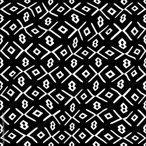 White background with black pattern.Repeat Pattern for fashion, textile design,  on wall paper, wrapping paper, fabrics and home decor. Seamless pattern in grunge style.