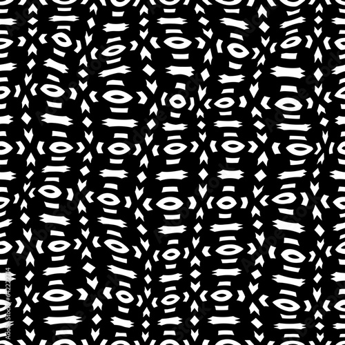 White background with black pattern.Repeat Pattern for fashion, textile design,  on wall paper, wrapping paper, fabrics and home decor. Seamless pattern in grunge style.