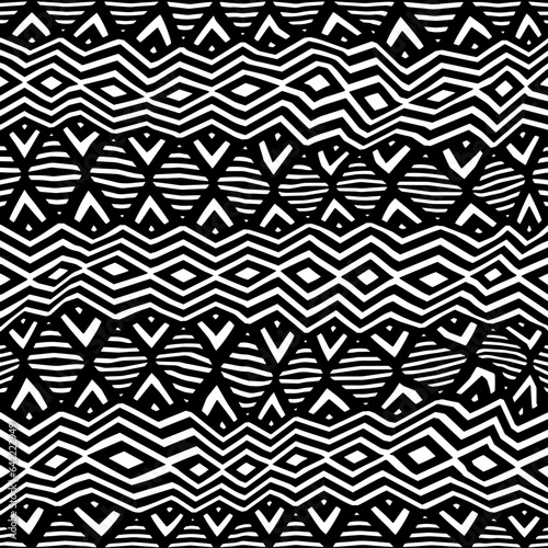 White background with black pattern.Repeat Pattern for fashion, textile design,  on wall paper, wrapping paper, fabrics and home decor. Seamless pattern in grunge style.