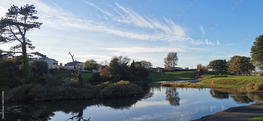 Naklejka premium Blackrock Park, Dublin, Ireland lush green along the lake