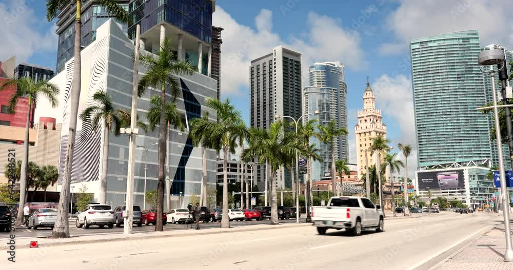 Cars and traffic move along the downtown business and shopping areas in the financial district of Miami Cars and traffic move along the downtown business and shopping areas in the financial district of Miami