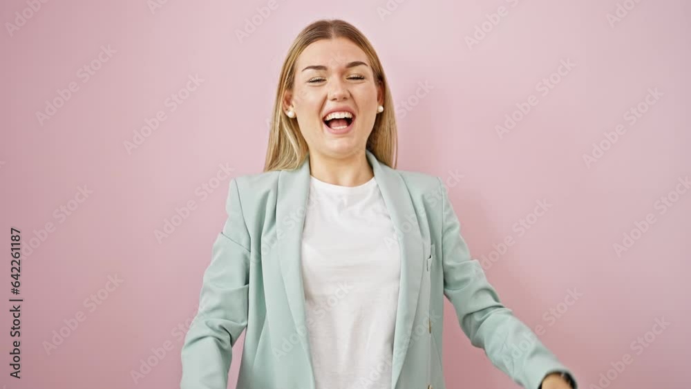 Young blonde woman business worker laughing a lot over isolated pink background Young blonde woman business worker laughing a lot over isolated pink background