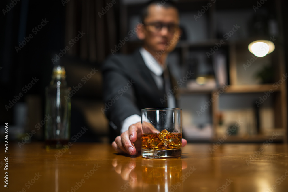 Businessmen in suits drinking whiskey Businessmen in suits drinking whiskey