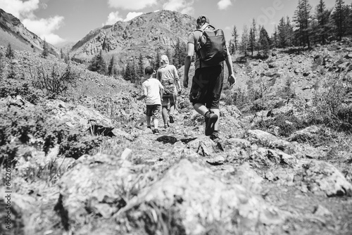 hiking in the mountains. Black and white toned image 