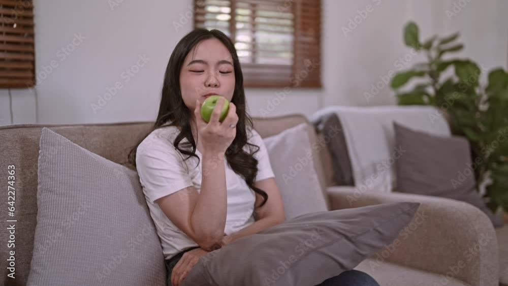 Portrait of beauty body slim healthy asian woman eating an apple, Fitness and healthy food. Portrait of beauty body slim healthy asian woman eating an apple, Fitness and healthy food.