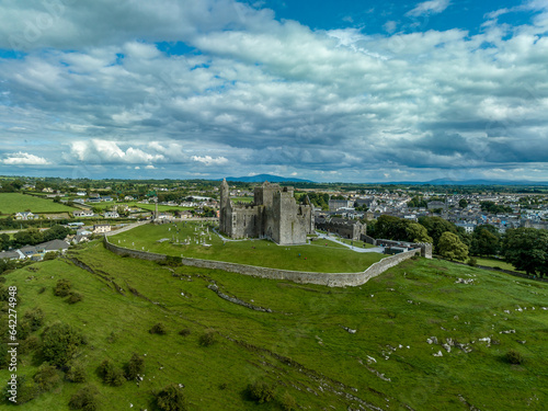 Aerial view of Rock of Cashel iconic Irish historic landmark with Romanesque chapel, a Gothic cathedral, an abbey, the Hall of the Vicars Choral and a fifteenth-century Tower House