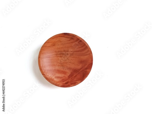 wooden plate isolated on white photo