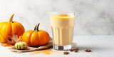 close up of Fresh pumpkin Juice with fruits on table, isolated on white background, copy space