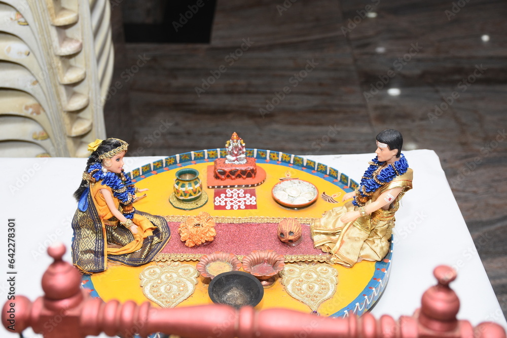 Fototapeta premium colorful clay dolls describing Tamil brahmin wedding couple on their wedding day
