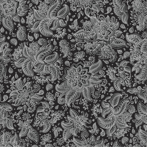 Vector floral seamless pattern. Silver colored Paisley elements, fantasy flower, leaves on a black background. Vintage Textile print. Batik painting