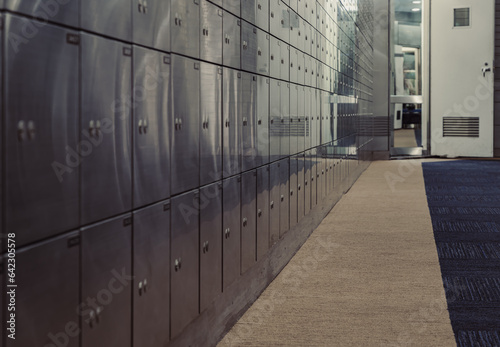 Bangkok, Thailand - 31 Aug, 2023 - Safe deposit boxes inside bank vault with closed steel doors. Metal deposit lockers, Space for text, Selective focus.
