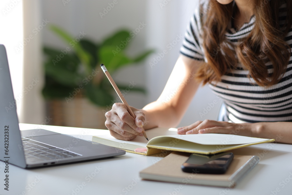 Woman studying online seminar on internet laptop. - obrazy, fototapety, plakaty 