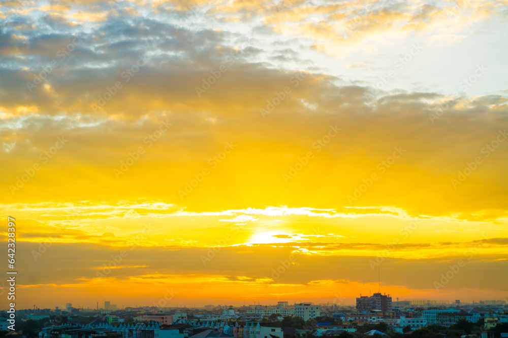 Sunrise with cloud and building in the city