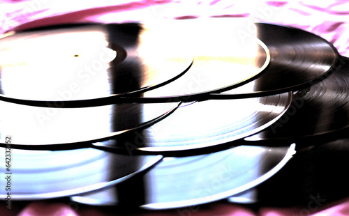 the light reflects on some old vinyls photo