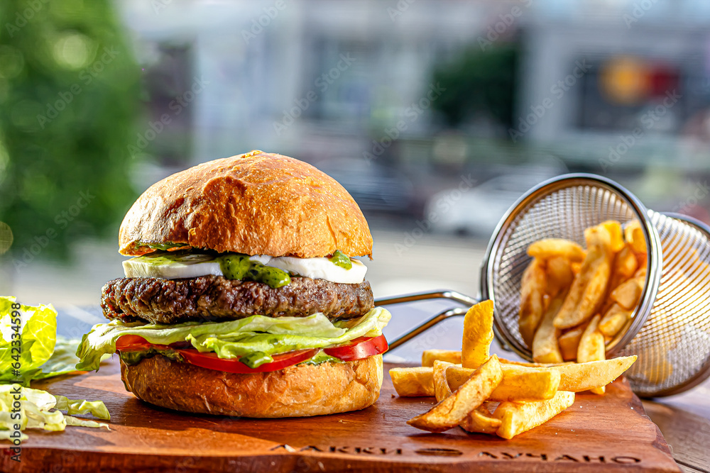 Lamb burger. Hamburger made with lamb meat. Classic traditional Greek ... Lamb burger. Hamburger made with lamb meat. Classic traditional Greek ...