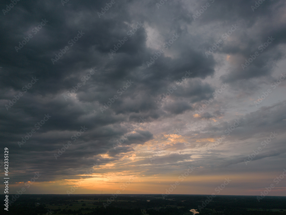 cloudscape sky in sunset from aerial view. storm clouds over