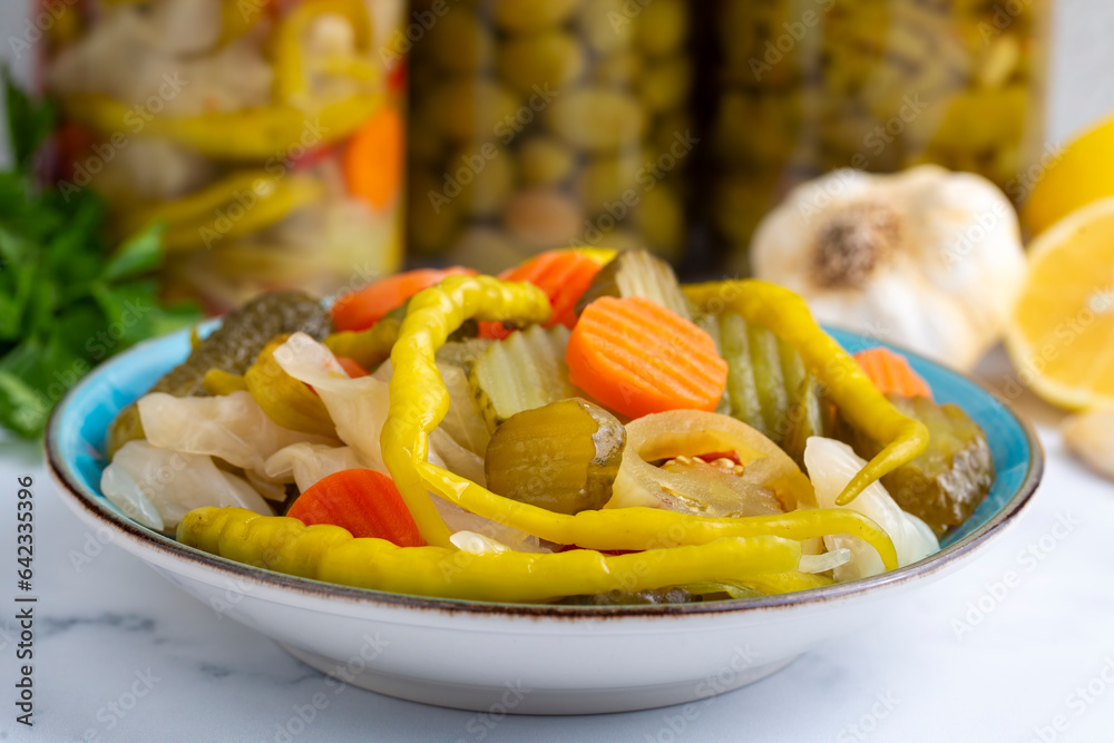 Assorted mixed pickled vegetables in bowl - plate, Turkish name; tursu.