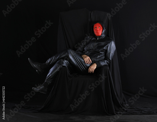 Bilde på lerret portrait of a man in a strange theatrical mask on a black background