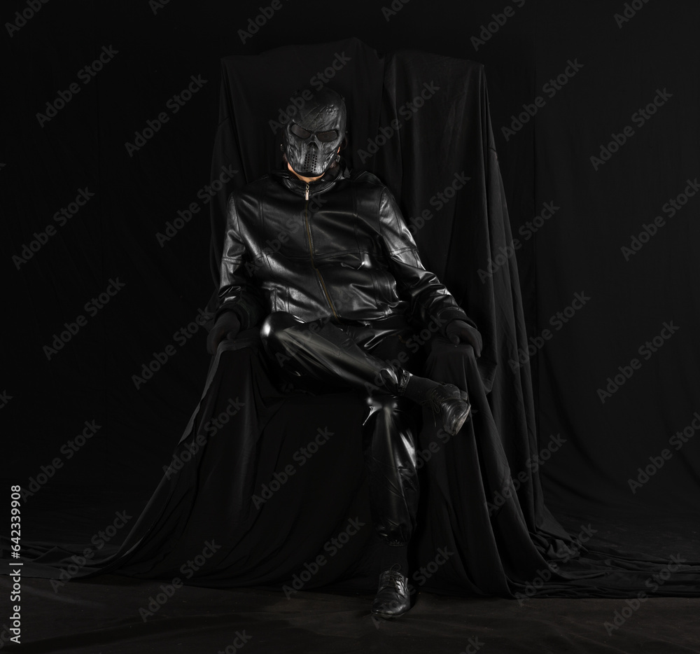 portrait of a futuristic soldier in a mask on a black background portrait of a futuristic soldier in a mask on a black background