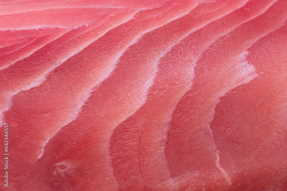 Macro shot yellow fin tuna steak background. Fresh rare steak close up