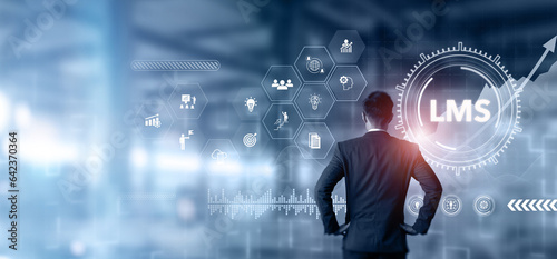 LMS - Learning Management System concept. Online learning platform. HR manager planning and analysis corporate learning management system to streamline content delivery and measure the effectiveness.