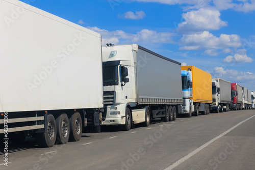 Trucks on road in a traffic jam