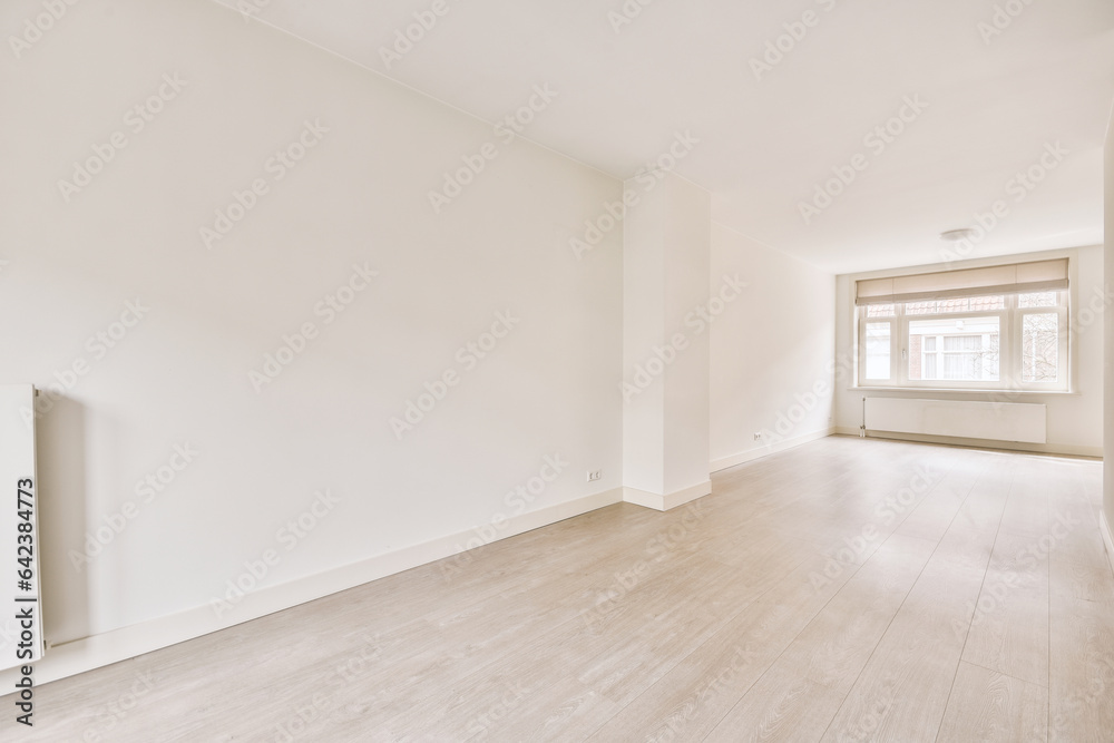 Empty room with window and radiator Empty room with window and radiator