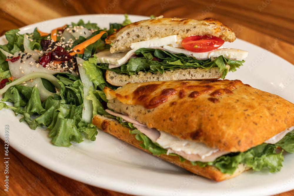 Delicious sandwich with sauce and green leaves served with chapatas Delicious sandwich with sauce and green leaves served with chapatas