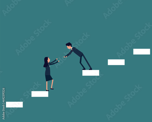 Business team pulling partner up the stairs