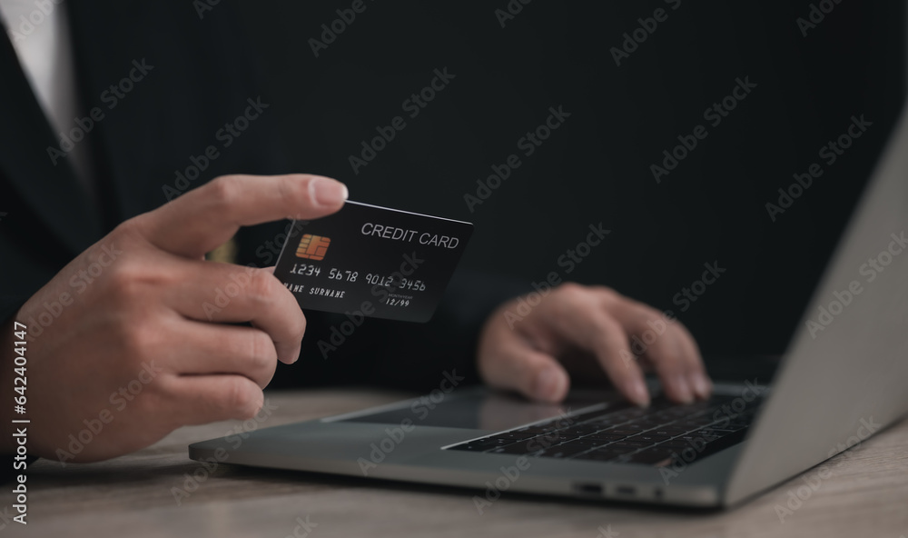 Concept e banking or e commerce : business man using his Laptop for payment by wallet app technology or digital money transfer after his shopping something by application . Concept e banking or e commerce : business man using his Laptop for payment by wallet app technology or digital money transfer after his shopping something by application .