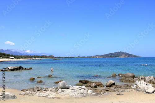 Fototapeta Naklejka Na Ścianę i Meble -  May 23 2023 - Arbatax, Sardinia, Italy: people at the hakuna matata beach with white sand and crystal clear water