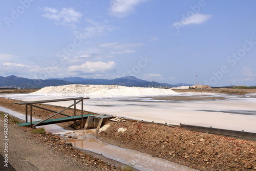 View of the cannels and work in salt pans near Cagliari, Italy photo