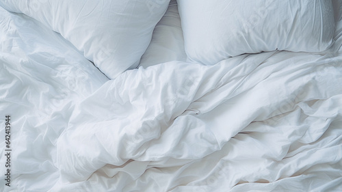 white pillows on a bed, top view