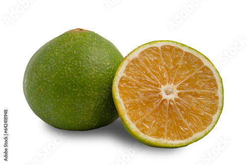 Fototapeta Naklejka Na Ścianę i Meble -  Half and whole of green tangerines on a white background