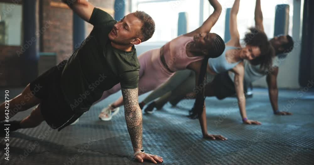 Exercise, class and people in gym, muscle training and body stretching with workout for health and wellness. Bodybuilding, active and fitness at club sports group and strong together with energy