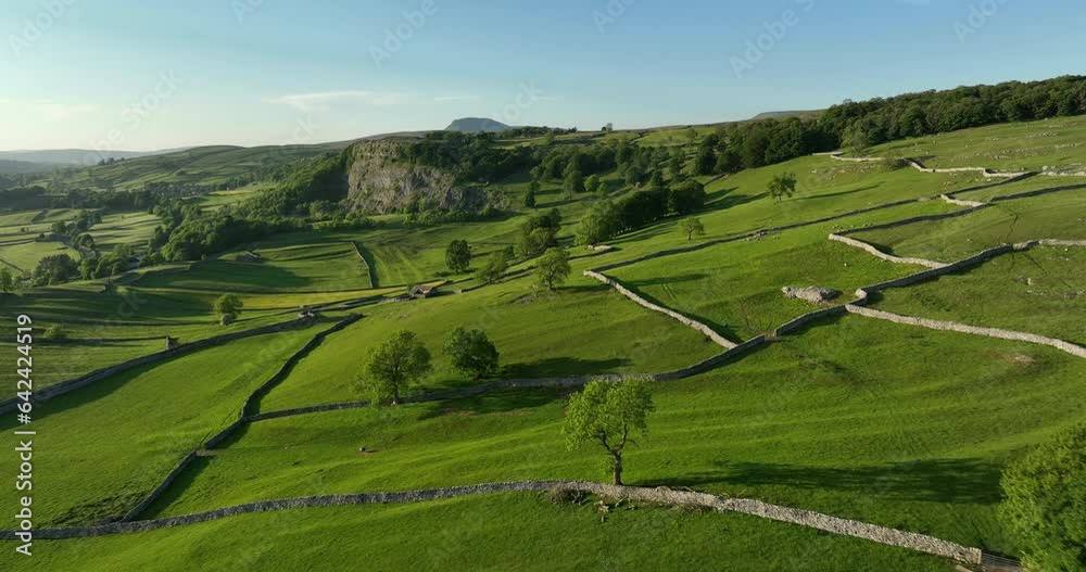 Flying over a sunny valley in Yorkshire Dales Flying over a sunny valley in Yorkshire Dales