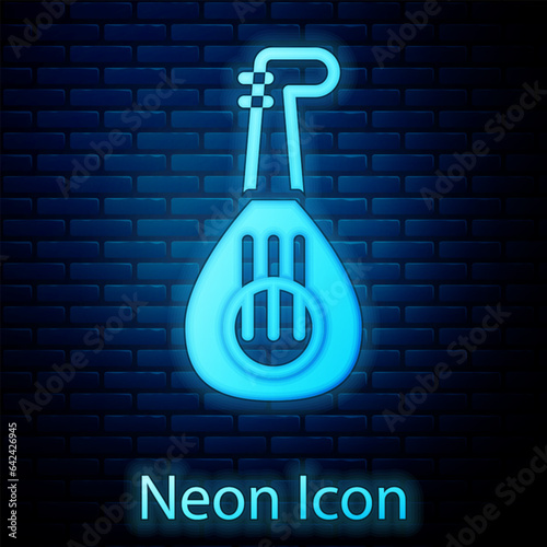 Glowing neon Musical instrument lute icon isolated on brick wall background. Arabic, Oriental, Greek music instrument. Vector