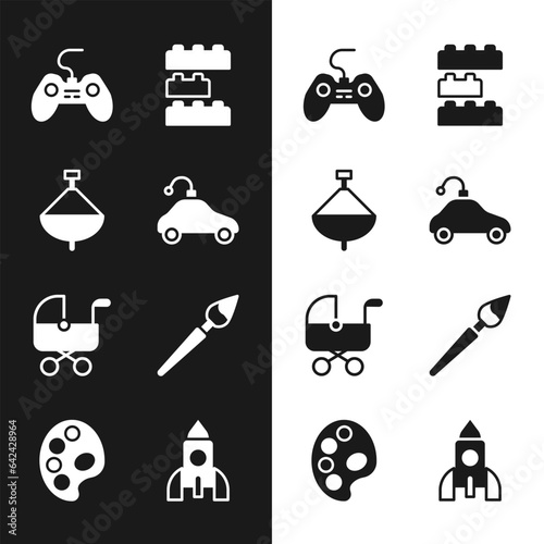 Set Radio controlled car toy, Whirligig, Gamepad, Toy building block bricks, Baby stroller, Paint brush, Rocket ship and Palette icon. Vector
