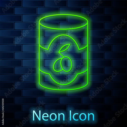 Glowing neon line Olives in can icon isolated on brick wall background. Concept of canned food. Vector