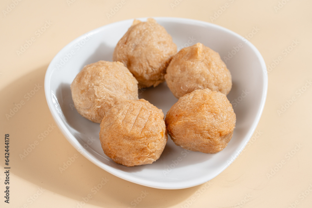 Pempek is a savoury Indonesian fishcake delicacy, made of fish and tapioca from Palembang. Pempek is served with sweet and sour sauce. Pempek is a savoury Indonesian fishcake delicacy, made of fish and tapioca from Palembang. Pempek is served with sweet and sour sauce.
