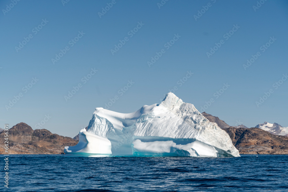 arctic iceberg floating on arctic ocean in greenland arctic iceberg floating on arctic ocean in greenland