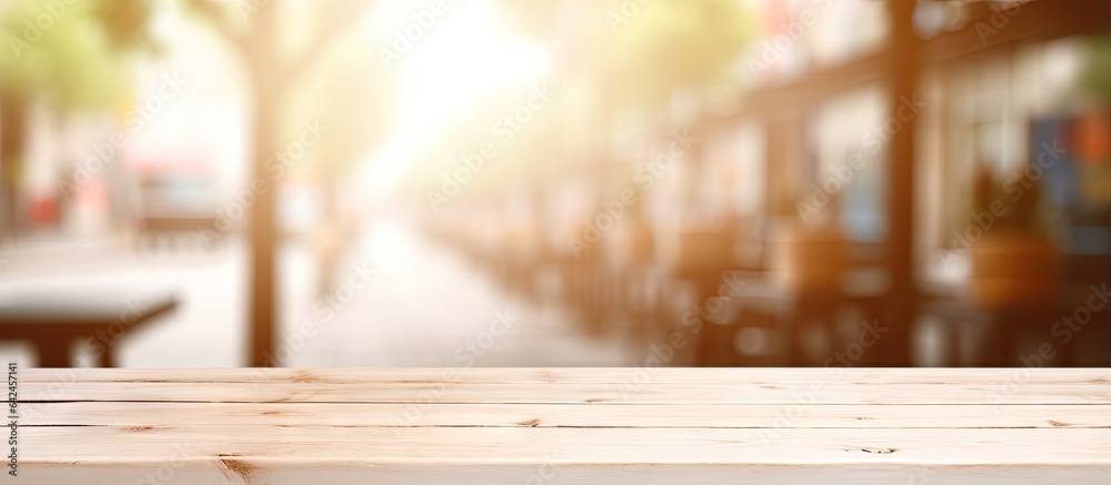 Fototapeta premium Blurry background of small shop interior with an aged white wooden table