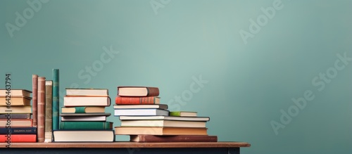 Books piled on table