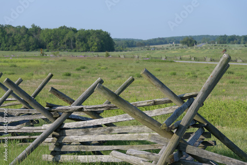 Wooden stacked fence. Gettysburg battlefield in the background. Pennsylvania