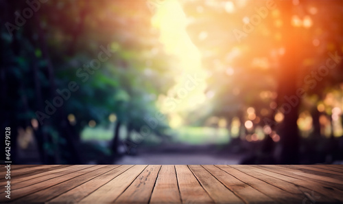 Wood floor on Blurred Defocused Lights. The perspective brown wood table over blur trees. wooden board empty table in front of blurred background