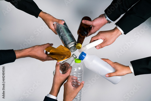 Top view hand holding garbage waste on isolated background. Eco-business recycle waste policy in corporate responsibility. Reuse  reduce and recycle for sustainability environment. Quaint