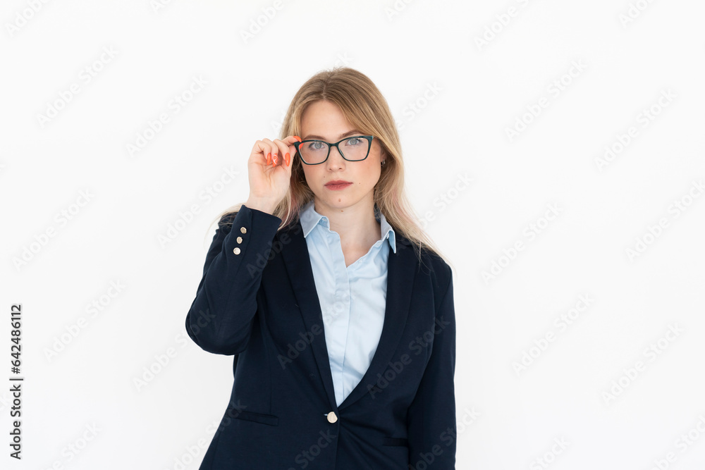 Young confident business lady standing isolated on white background Young confident business lady standing isolated on white background